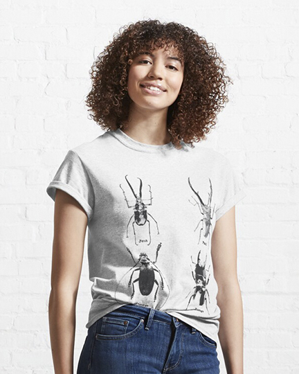 model wearing write T-shirt with design consisting of 4 beetles with the names 'John, Paul, George, and Ringo' below each